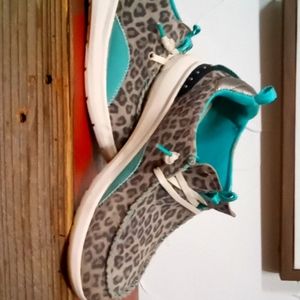 Women's slip on Ariat turquoise and cheetah shoes 7 and 1/2